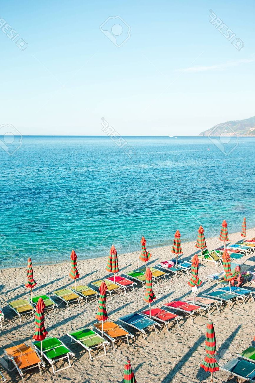 Italian Beach Umbrellas Regarding Well Known Empty Beach With Closed Umbrellas On Italian Coast (View 8 of 20)