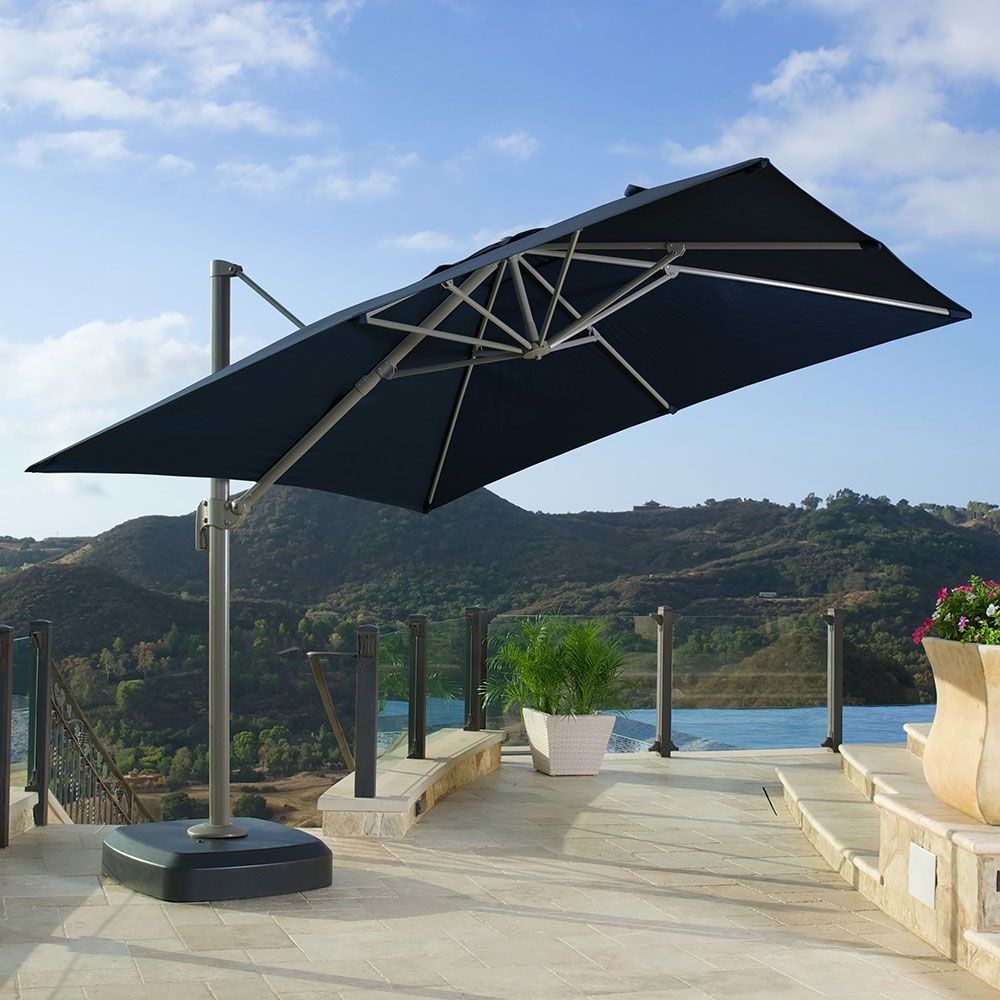 Mablethorpe Cantilever Umbrellas For Most Popular Portofino® Comfort Auto Tilt Dining Umbrella – Laguna Blue In  (View 16 of 20)