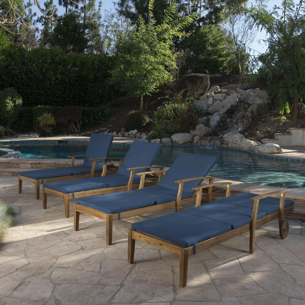 Most Popular Outdoor Acacia Wood Chaise Lounges And Cushion Sets Inside Noble House Perla Brown Wood Outdoor Chaise Lounge With Blue Cushions (set  Of 4) (View 18 of 25)