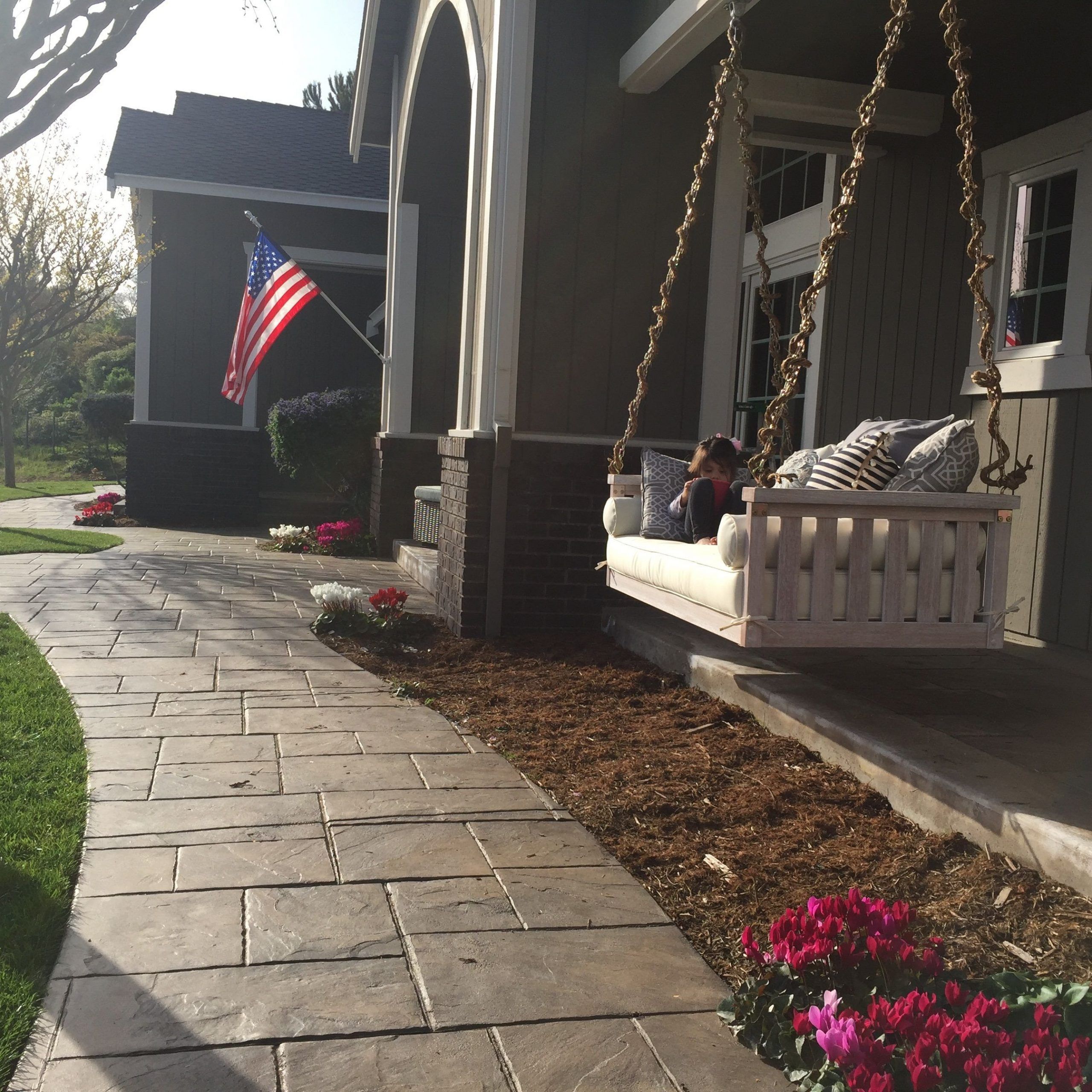 Front Yard, Porch Swing, American Flag, Stamped Concrete Intended For Famous American Flag Porch Swings (View 10 of 25)