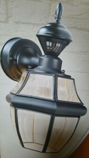>secure Home 14.75" Motion Activated Outdoor Carriage Wall With Latest Walland Black 14.75'' H Outdoor Wall Lanterns (Photo 10 of 15)