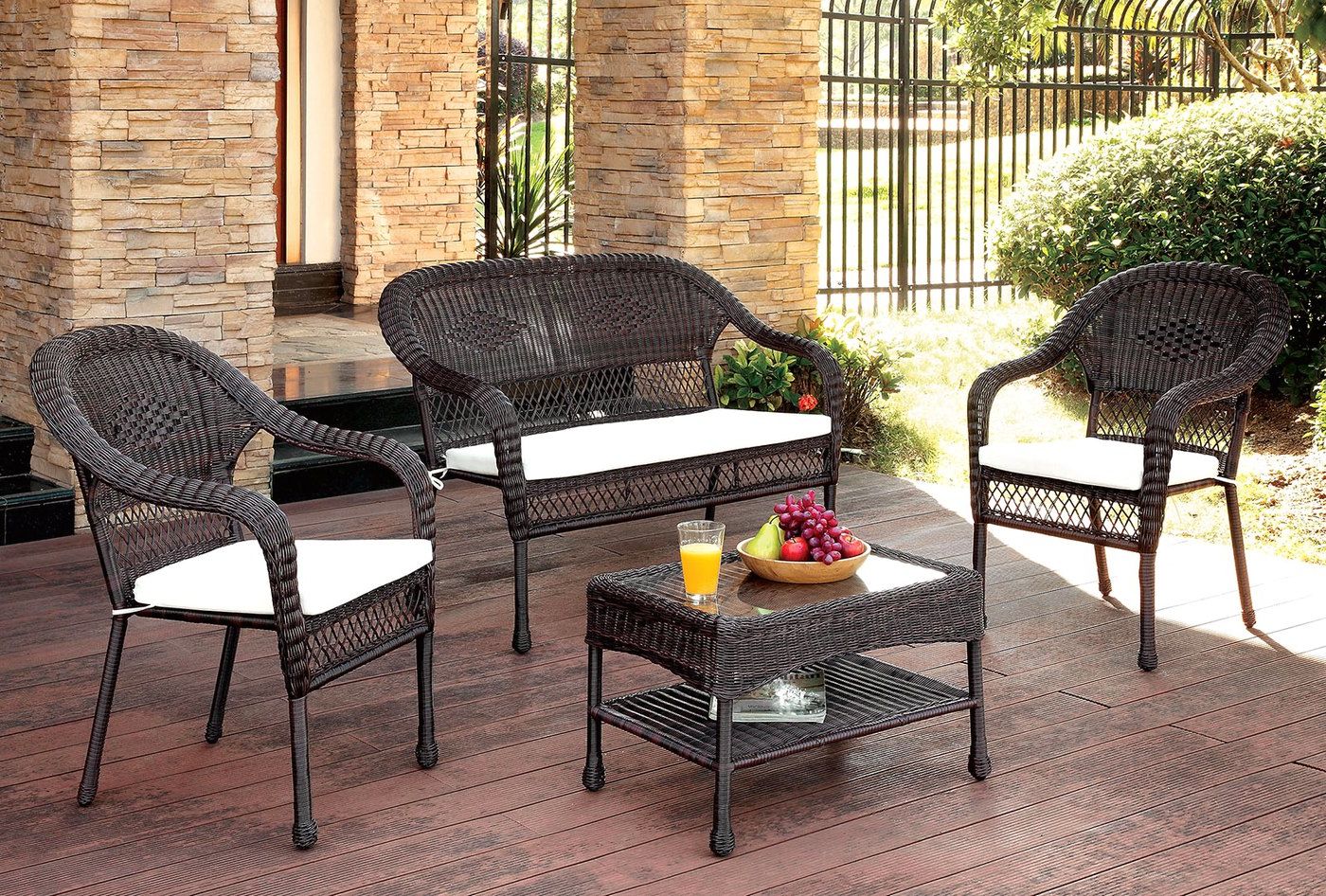 2020 Blue And Brown Wicker Outdoor Patio Sets Throughout Charleston Casual 4 Pc Brown Wicker Patio Seating Set W/ Ivory Cushions (View 2 of 15)