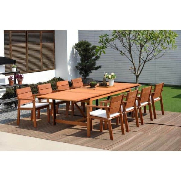 Best And Newest Off White Cushion Patio Dining Sets Within Amazonia Charles 9 Piece Patio Dining Set With Off White Cushions Sc (View 8 of 15)