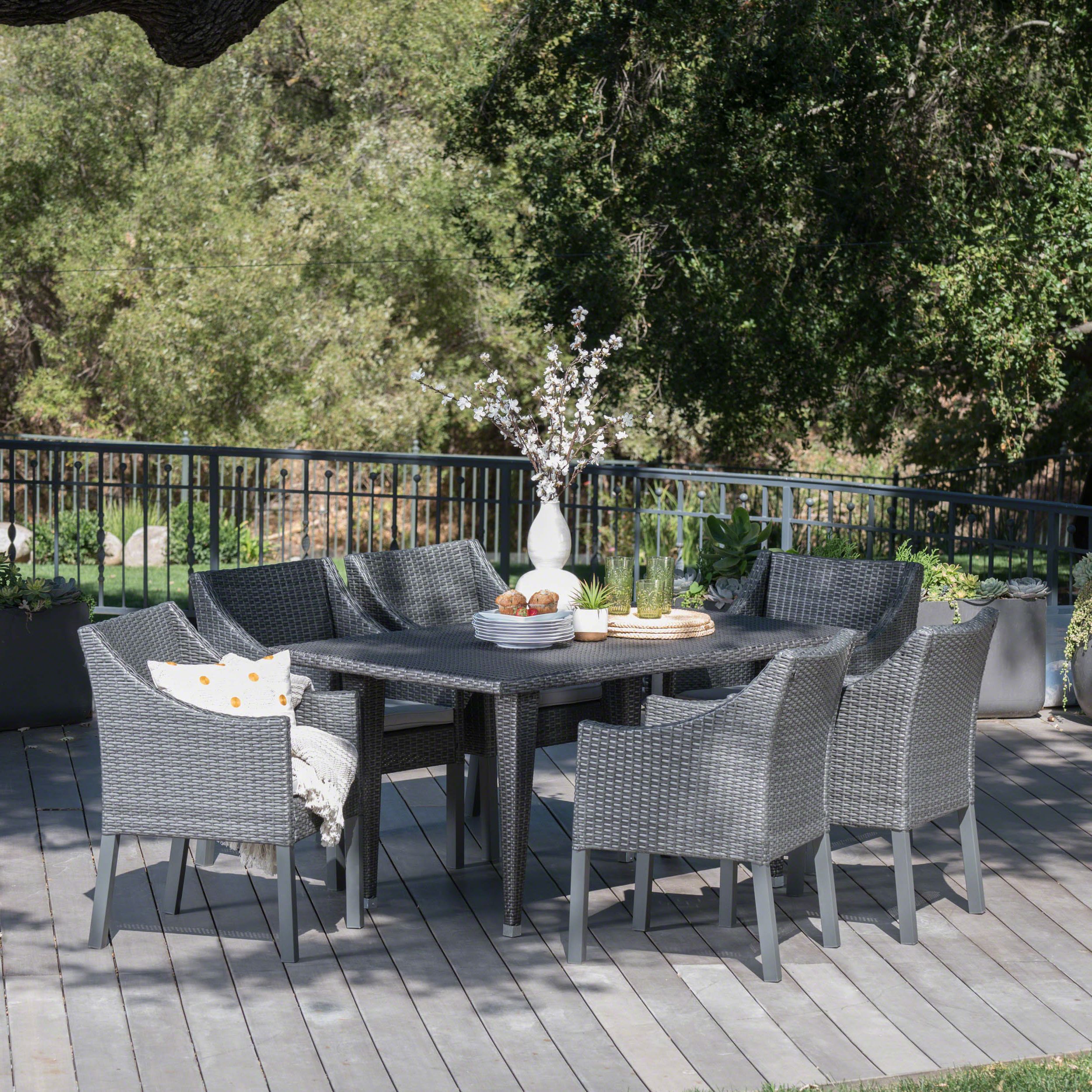 Most Up To Date Alanna Outdoor 7 Piece Wicker Rectangular Dining Set With Water In 7 Piece Patio Dining Sets With Cushions (View 8 of 15)