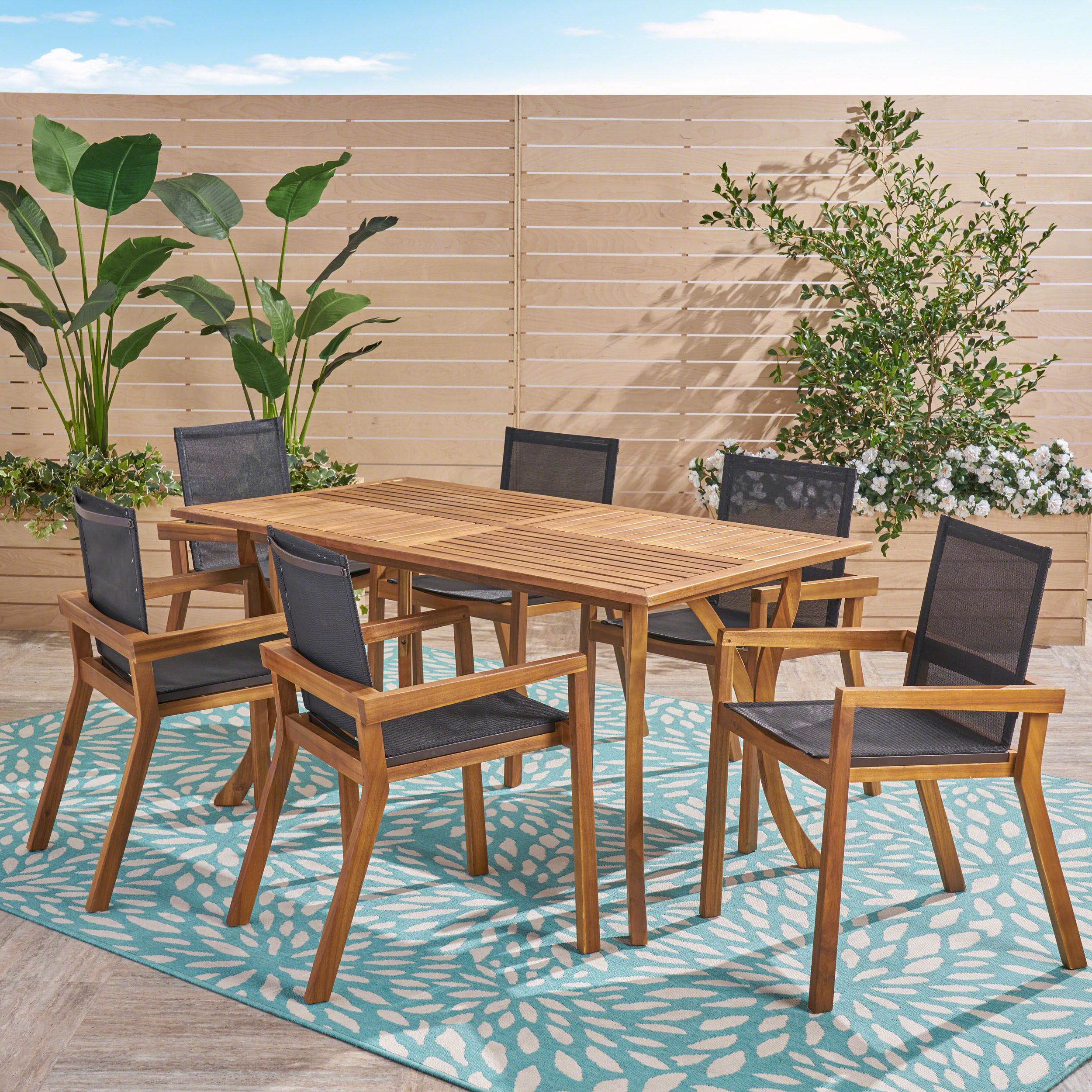 Popular Kaur Outdoor Acacia Wood 7 Piece Dining Set With Mesh Seats, Teak And In Acacia Wood Outdoor Seating Patio Sets (View 4 of 15)