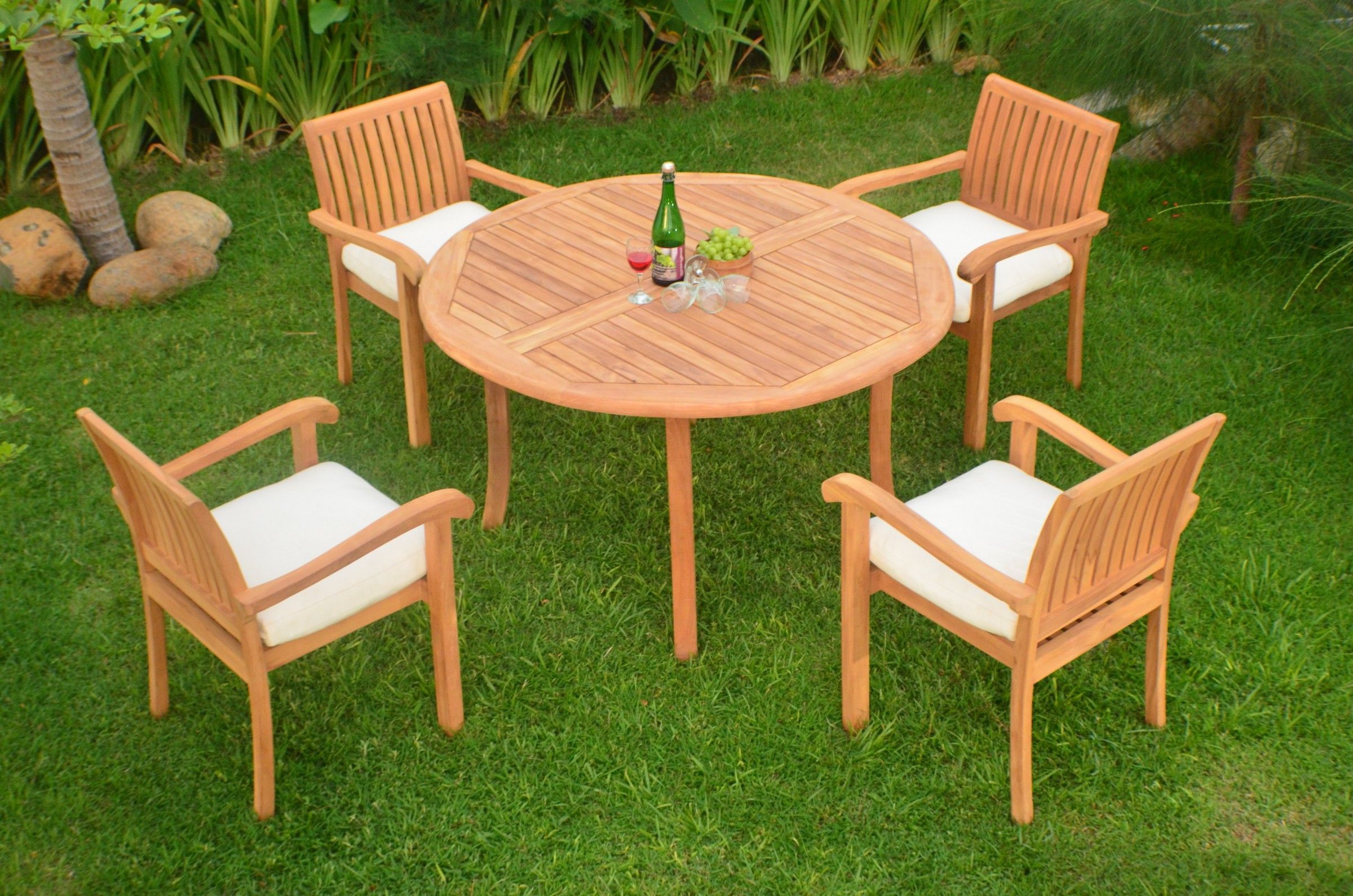 Teak Dining Set:4 Seater 5 Pc – 52" Round Table And 4 Stacking Napa Arm Inside Well Liked Teak Wood Outdoor Table And Chairs Sets (View 1 of 15)