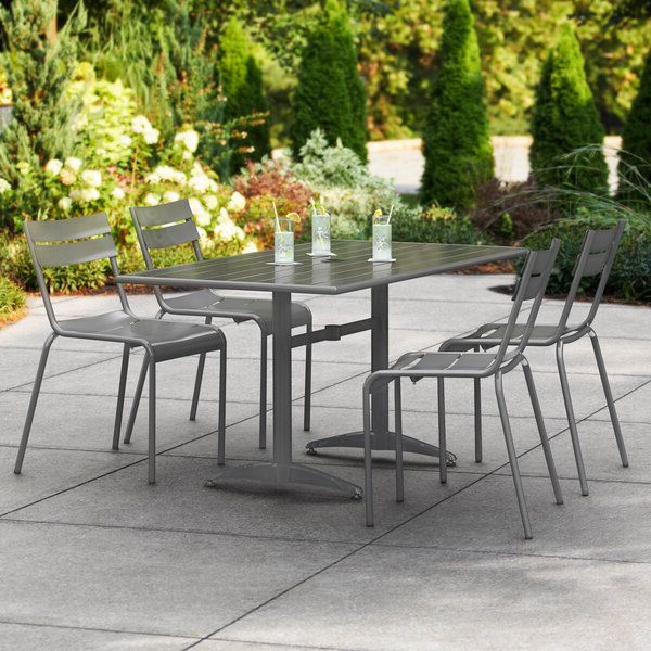 Lancaster Table & Seating 32" X 60" Matte Gray Powder Coated Aluminum  Dining Height Outdoor Table With Umbrella Hole And 4 Side Chairs With Regard To Favorite Matte Outdoor Tables (View 1 of 15)