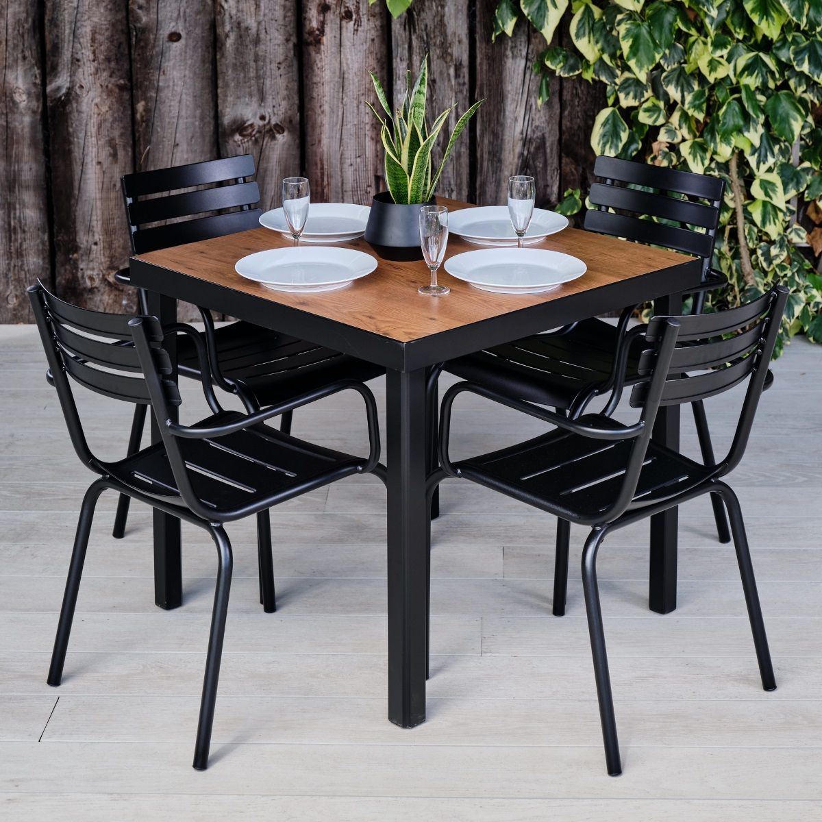 Metal And Wood Outdoor Tables Intended For Widely Used Black Metal & Wood Effect Table And 4 Chairs Set – Camden Range – Woodberry (View 8 of 15)