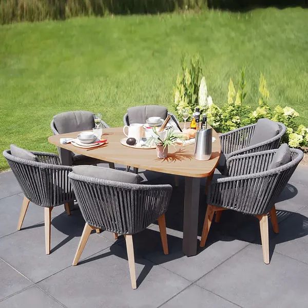 Triangular Outdoor Tables Inside Preferred 7 Piece Outdoor Dining Set With Triangular Dining Table And Rattan  Armchairs Homary (View 3 of 15)